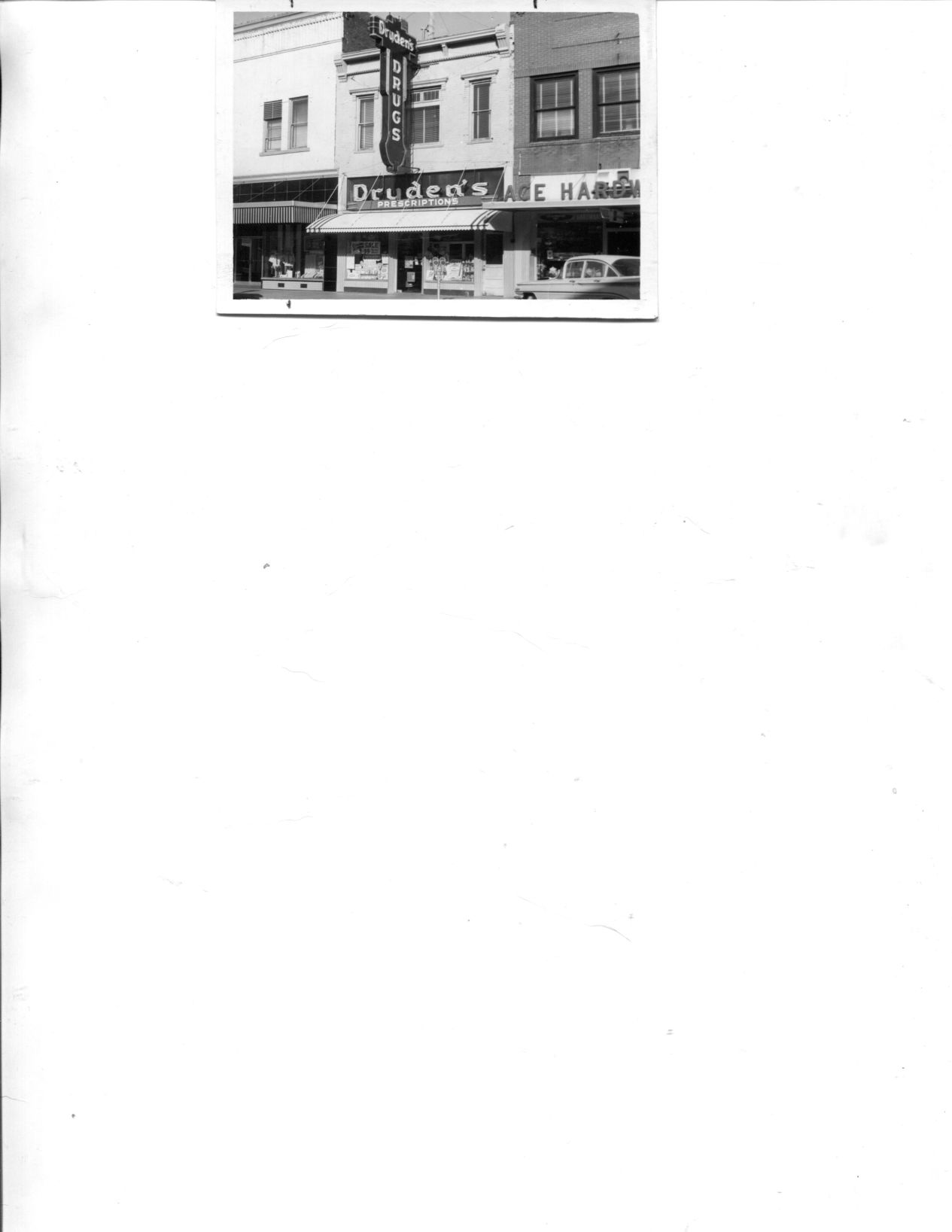 Original Dryden Drugs location, Tramp Building, N Dewey, NP, ca. 1960s (NPT file photo).jpg